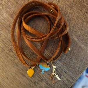 Sseko leather wrap bracelet with 3 charms